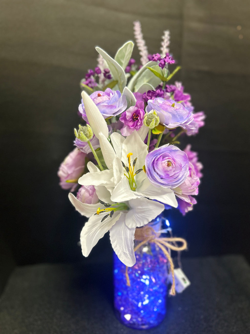 Purple & White Floral Arrangement in Blue Glass Vase
