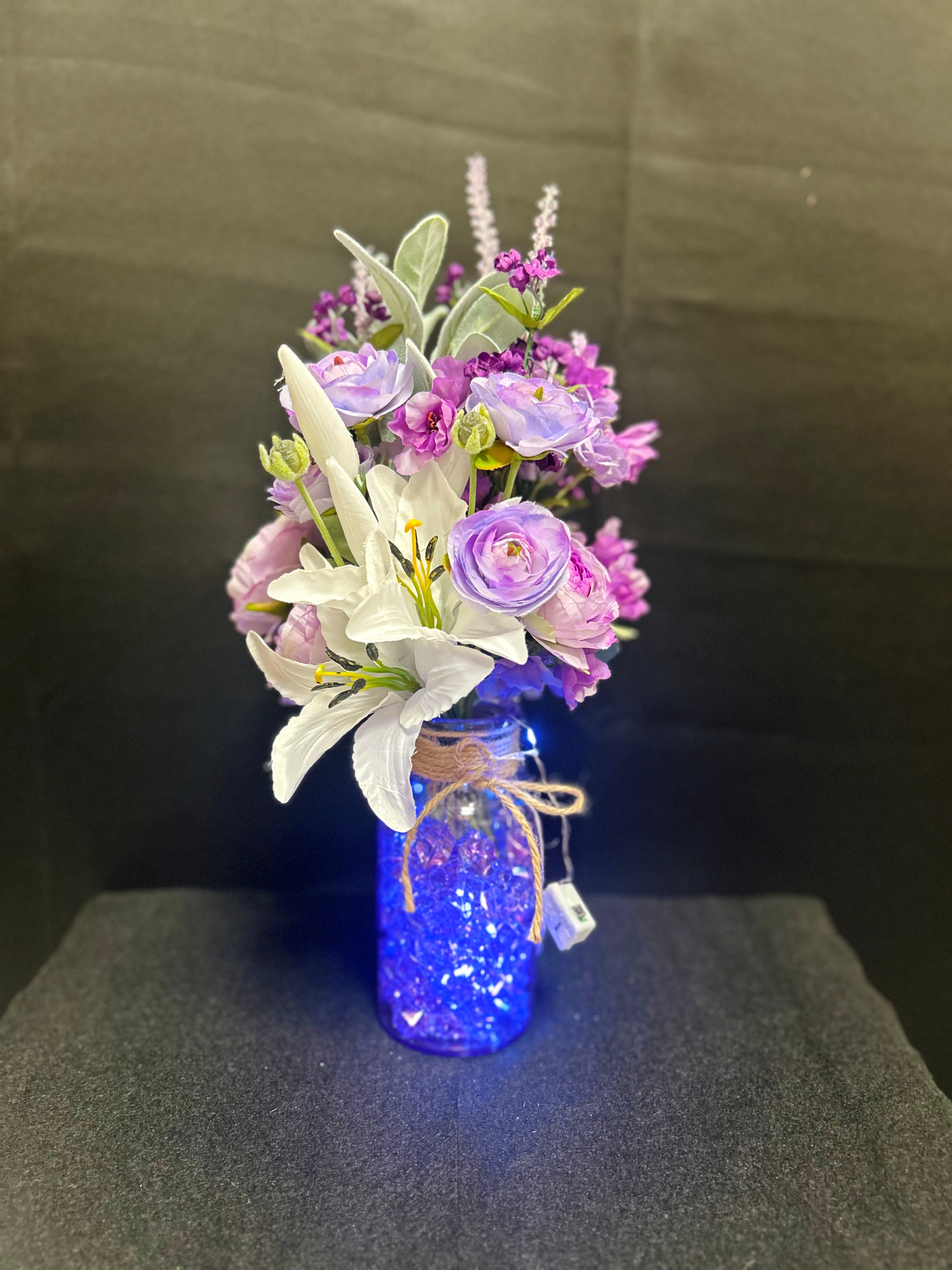 Purple & White Floral Arrangement in Blue Glass Vase