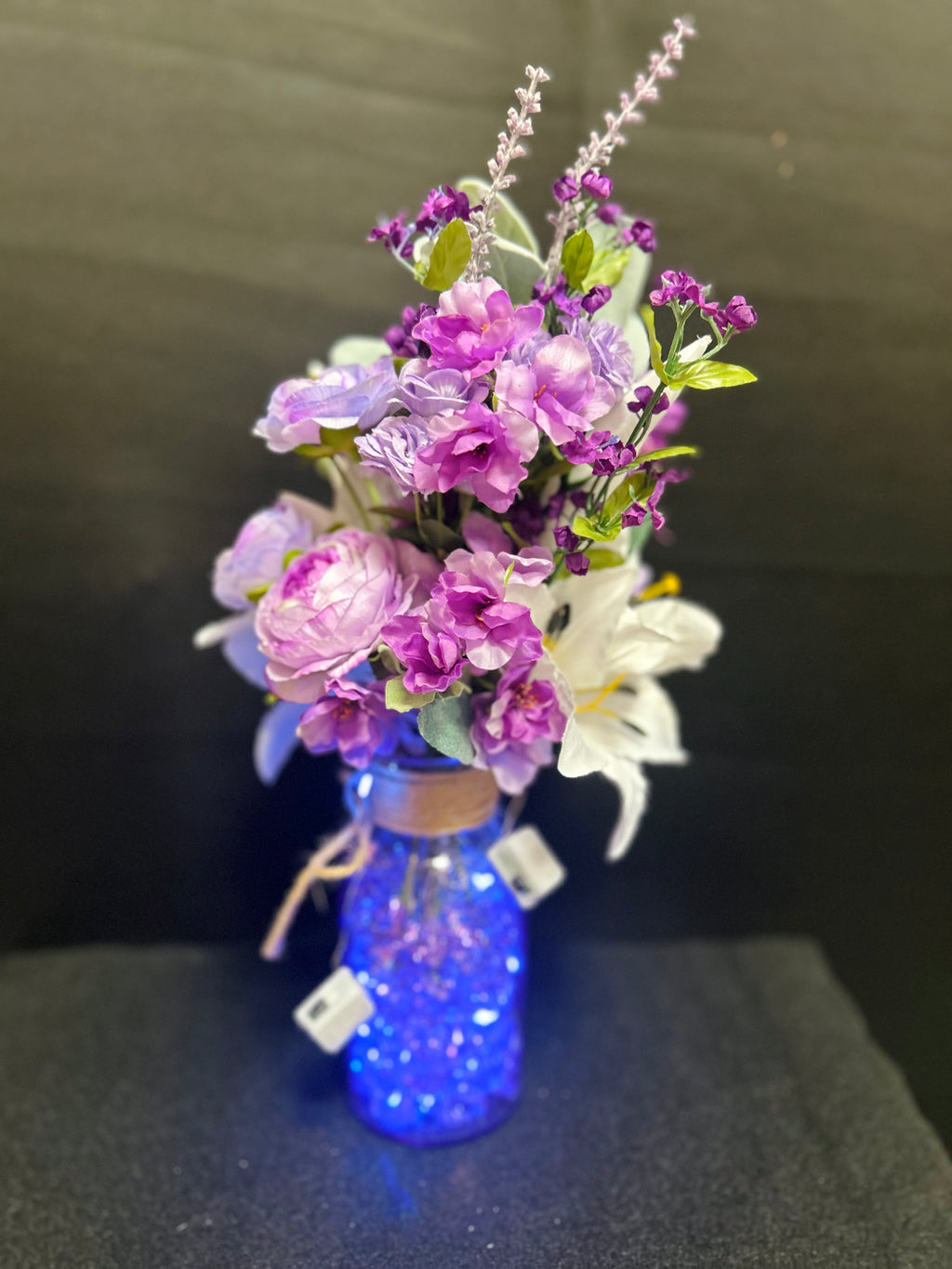 Purple & White Floral Arrangement in Blue Glass Vase