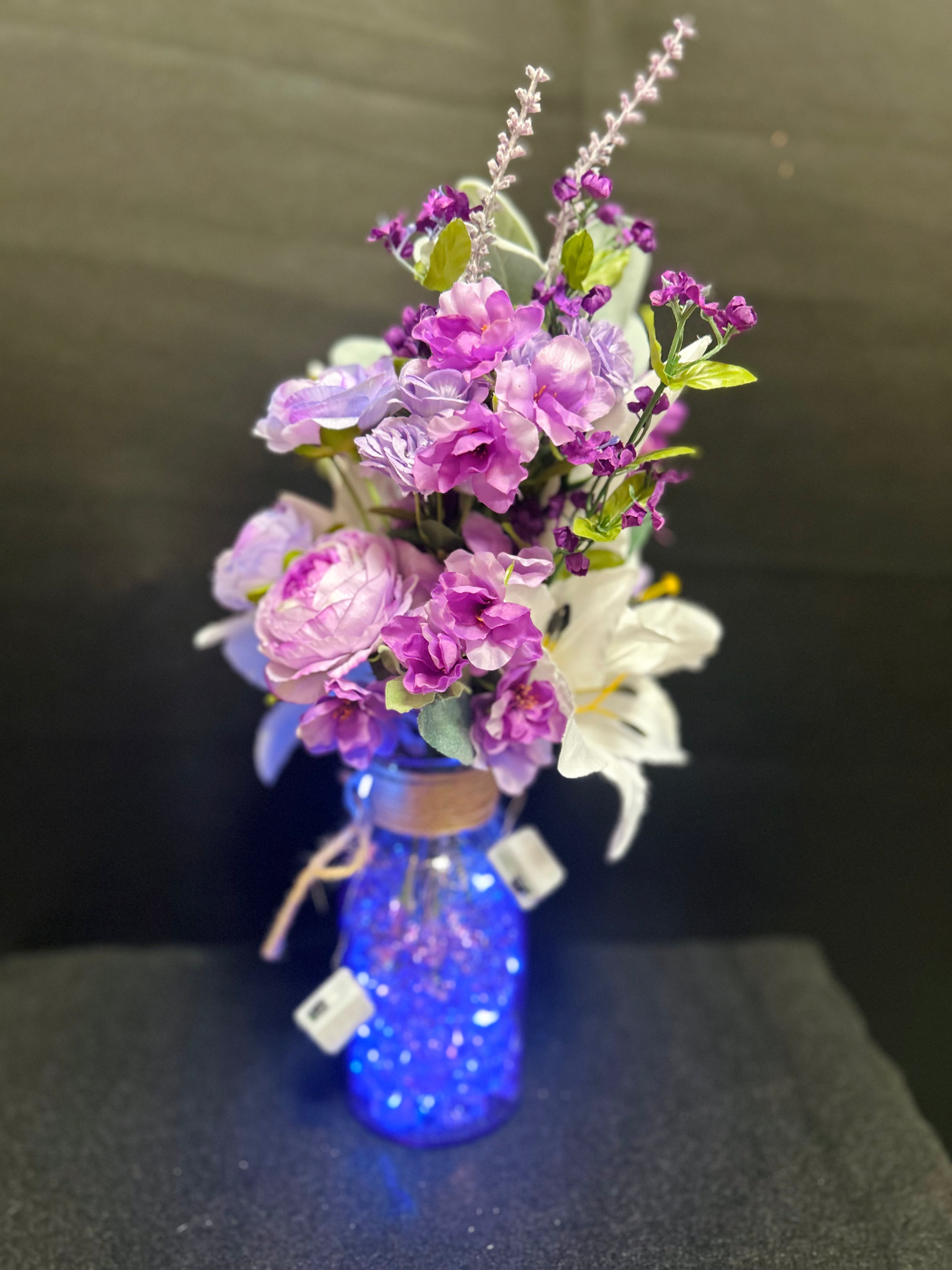 Purple & White Floral Arrangement in Blue Glass Vase